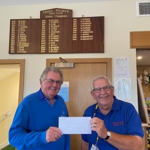 Barry Scaife from Troon Welbeck Golf Club presenting chairman Dick McLachlan with donation of £80 Troon Welbeck Golf Cub