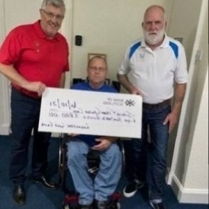 Iain McPhail, Ravenspark ,Golf Club and Sam Abercrombie, Irvine Golf Club presenting treasurer Gordon Rainey with a cheque for £800.00 raised at the Ravenspark v Bogside Synder Cup club match. Ravenspark & Irvine Golf Club